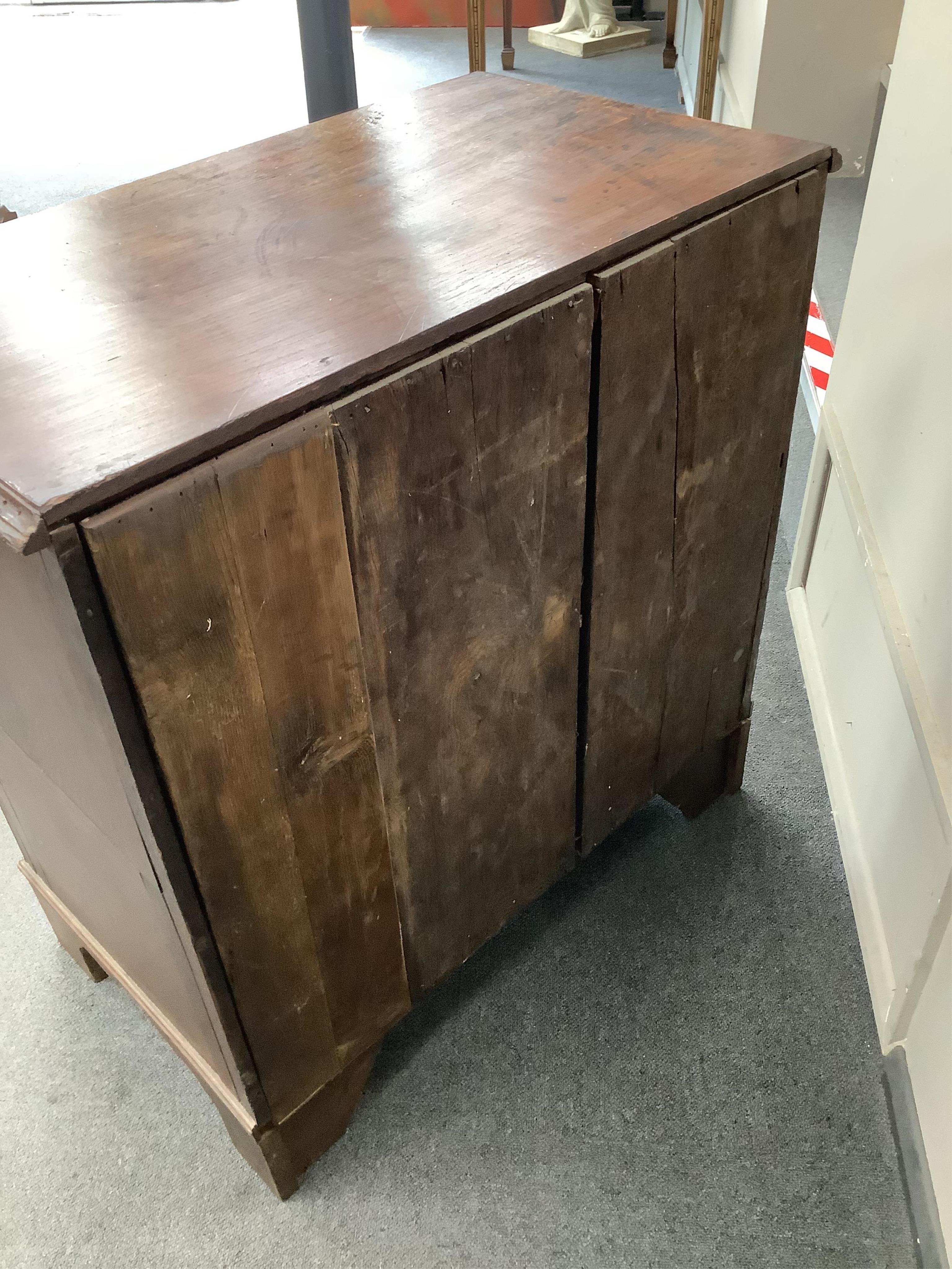 A small George III oak four drawer chest, width 80cm, depth 46cm, height 83cm. Condition - fair